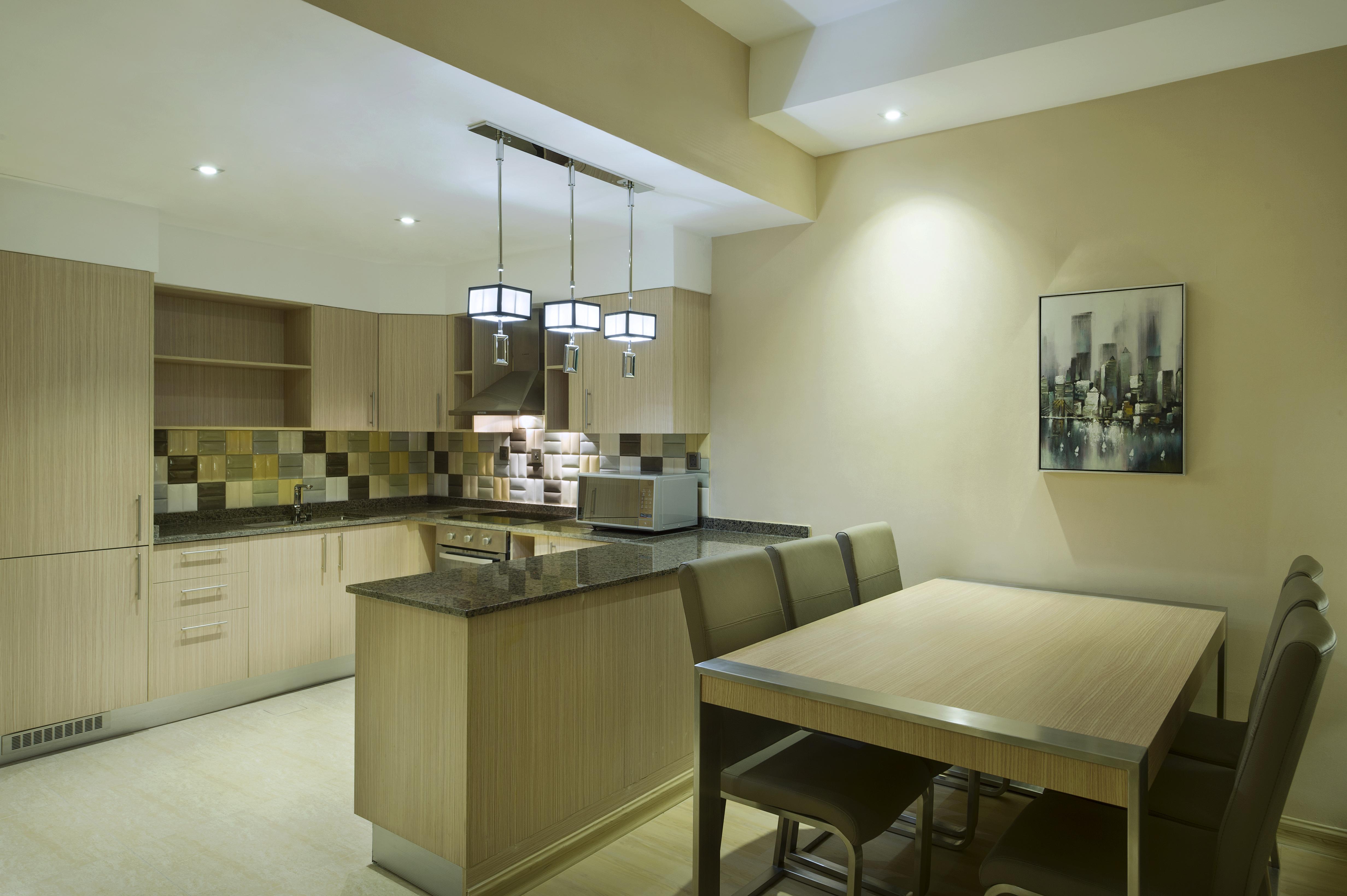Wyndham Doha West Bay Hotel Ngoại thất bức ảnh A kitchen in a serviced apartment in Dubai