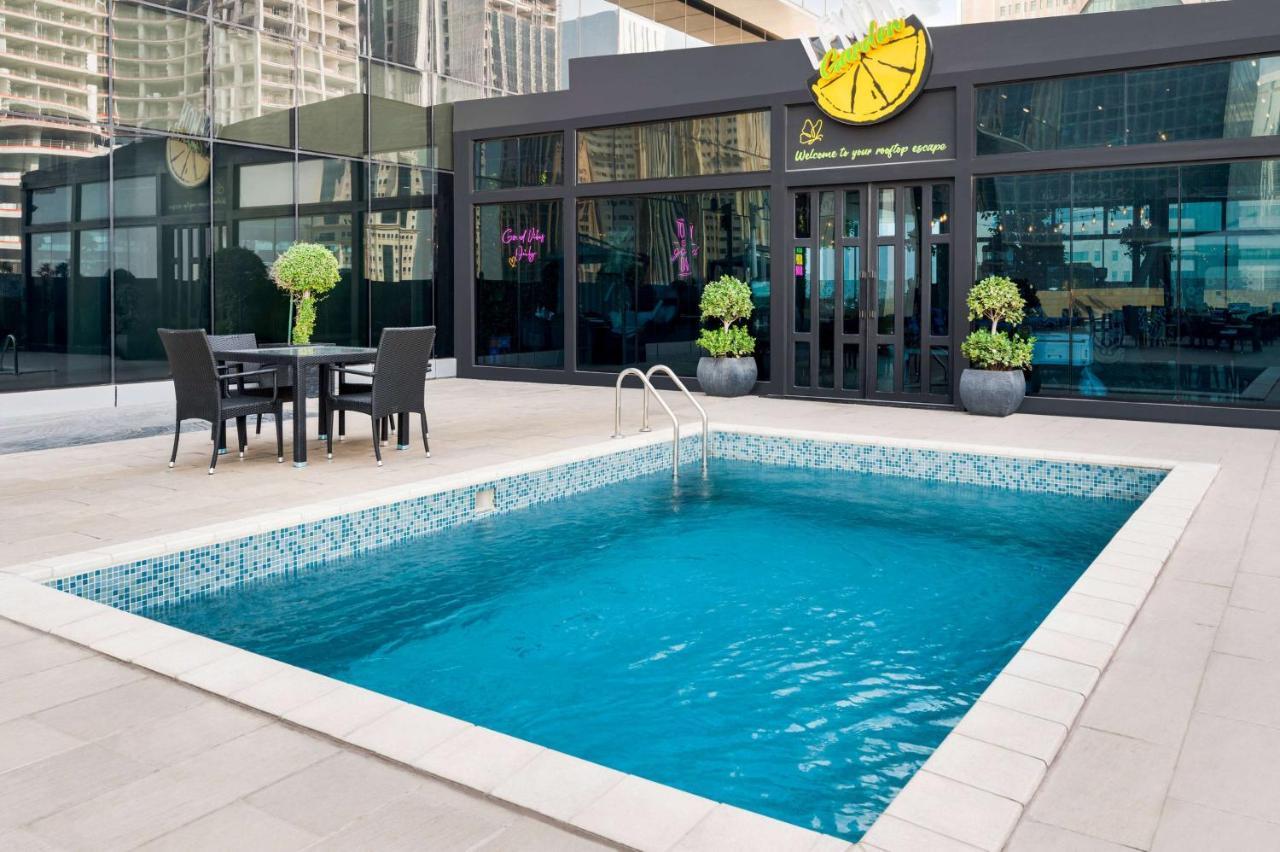 Wyndham Doha West Bay Hotel Ngoại thất bức ảnh The Lemon Pool